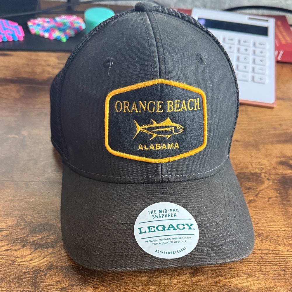 Legacy Black and Gold Orange Beach Cap